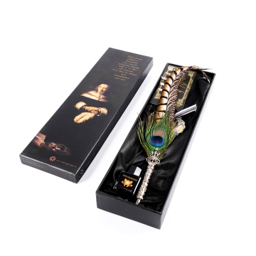 Calligraphy dip pen with a peacock quill and nibs, metallic stand and ink